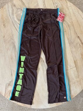 ‘VINTAGE’ brown sweatpants with blue and green detailing